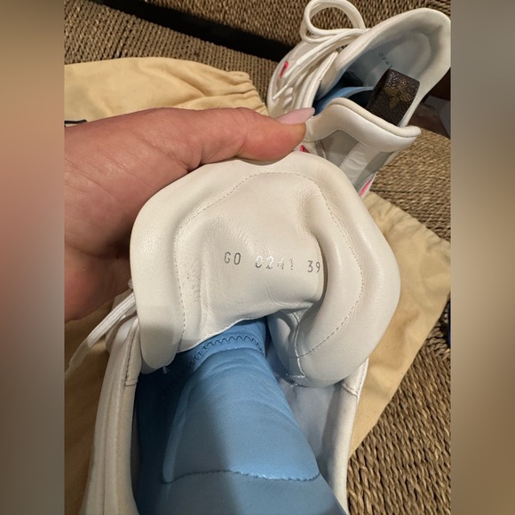 Louis Vuitton Good condition
White Sneakers with Blue and Pink Accents - Picture 8 of 10
